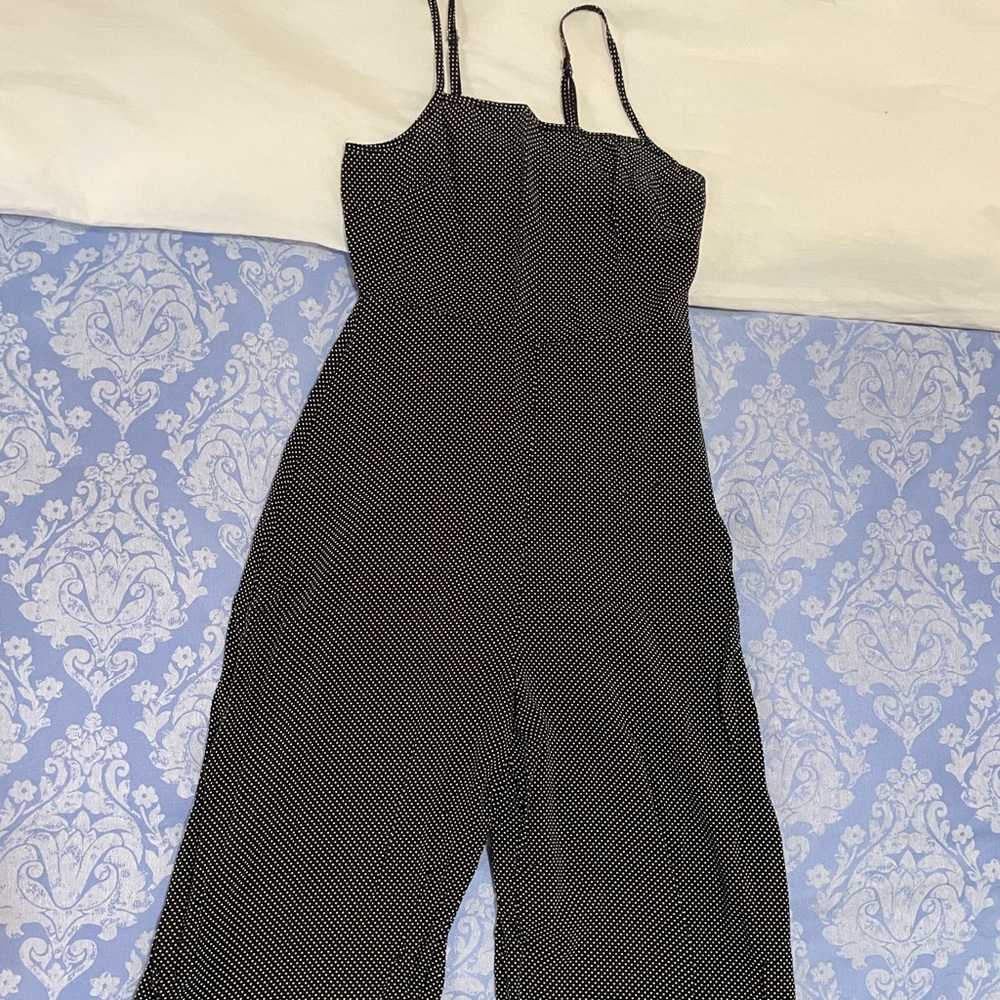 Black and white micro polka dot jumpsuit.
